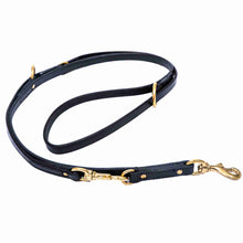 Load image into Gallery viewer, Hands-free leather dog leash from fireside hound, on a white background