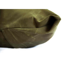 Load image into Gallery viewer, Fireside Hound waxed canvas dog bed cover closeup in green on a white background
