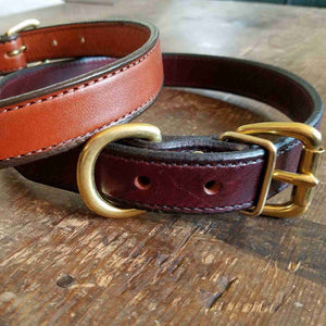 Two Fireside Hound leather dog collars on a white background